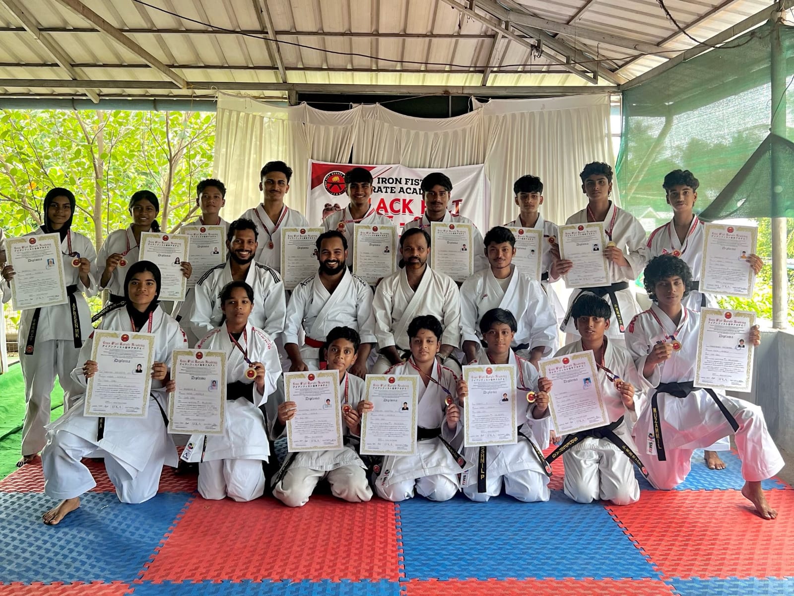 IFKA Black Belt Ceremony — Students with Diplomas